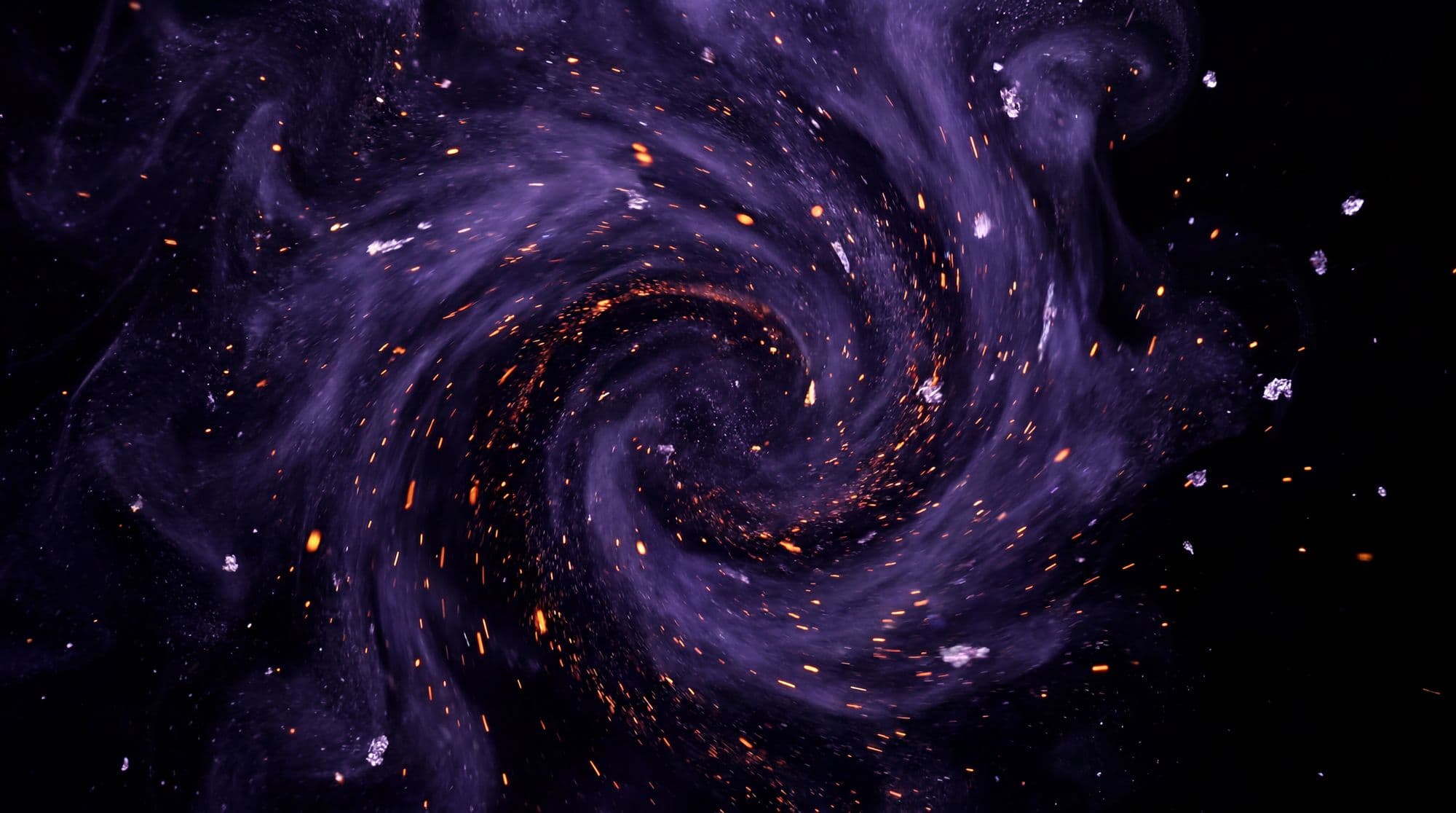 Violet embers spiraling in a dark vortex